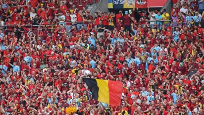 Belgium reach quarter-finals but lose key midfielder to serious injury